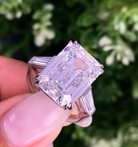 white emerald cut diamond ring