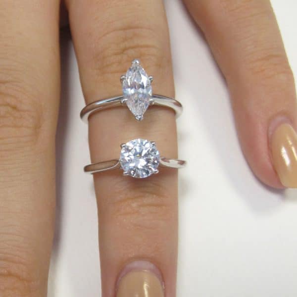 Marquise and round cut diamond solitaire ring