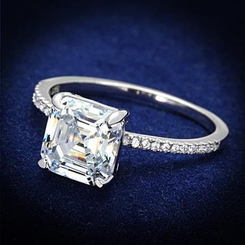 Asscher Cut diamond ring set in solitaire with micro pave diamonds. The band is thin to make the diamond look larger