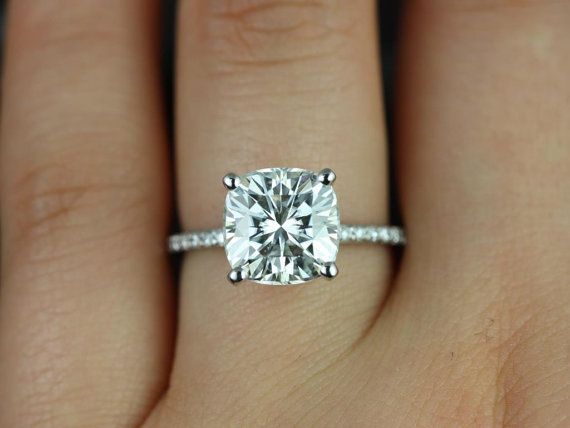 Solitaire cushion cut engagement ring